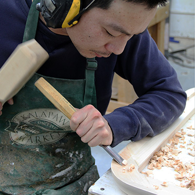 Peter Using a Chisel