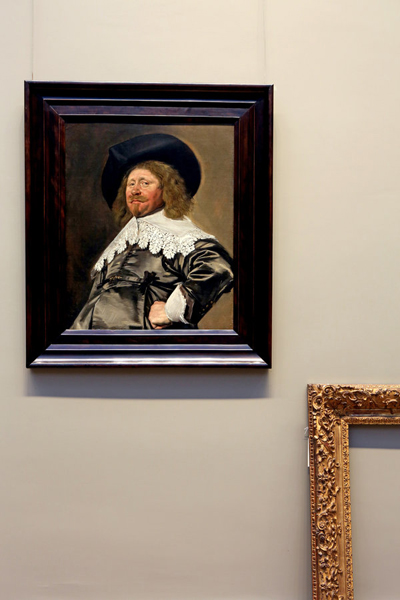 Frans Hal Portrait in New Frame with Empty Old Frame Against Wall